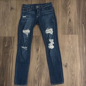 Skinny ripped blue jeans